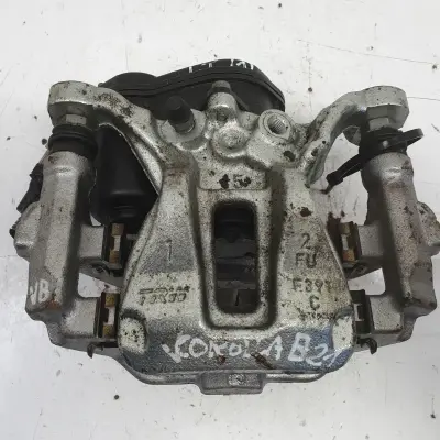 Toyota Corolla XII E21 TYLNY ZACISK HAMULCOWY lewy tył KIEROWCY