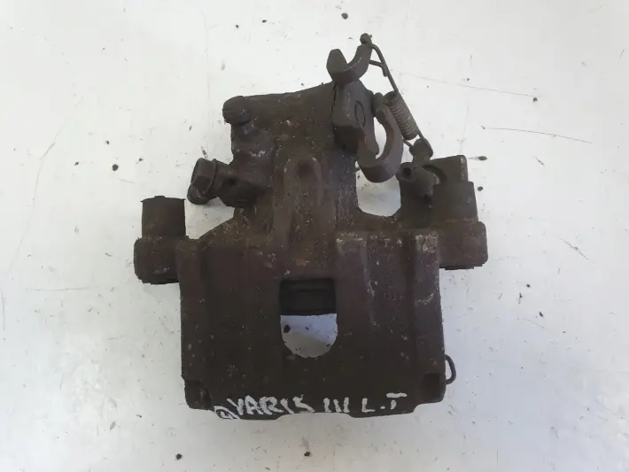 Toyota Yaris III TYLNY ZACISK HAMULCOWY lewy tył Kierowcy