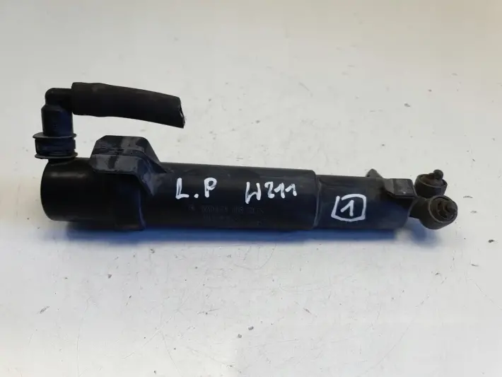 Mercedes W211 LEWY SPRYSKIWACZ LAMPY Reflektora 2118600547