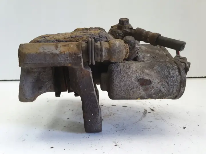 VW Tiguan TYLNY ZACISK HAMULCOWY prawy tył ORYGINAŁ