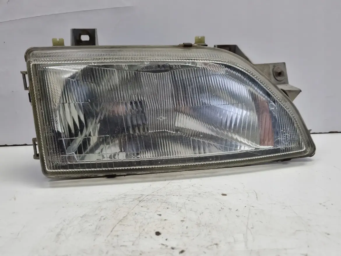 Ford Escort V MK5 Orion PRZEDNIA LAMPA PRAWA prawy przód 91AG13005SA2A