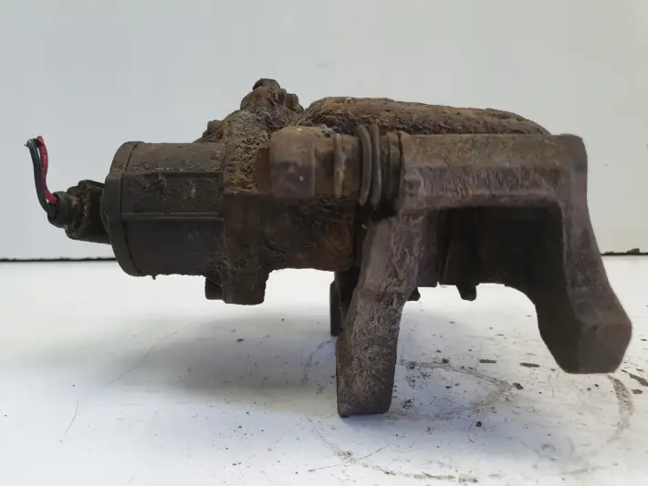 VW Tiguan TYLNY ZACISK HAMULCOWY prawy tył ORYGINAŁ