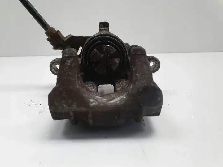 VW Golf IV Bora Audi A3 LEWY ZACISK HAMULCOWY tył kierowcy Lucas