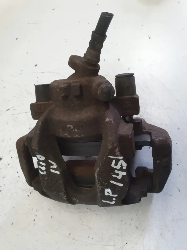 Renault Clio IV LEWY PRZEDNI ZACISK HAMULCOWY przód kierowcy 410104961R