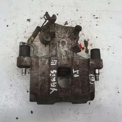 Toyota Yaris III TYLNY ZACISK HAMULCOWY prawy tył