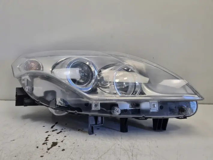 Renault Laguna III 07-10r PRZEDNIA LAMPA PRAWA PRAWY PRZÓD 260100033R