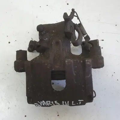 Toyota Yaris III TYLNY ZACISK HAMULCOWY lewy tył Kierowcy