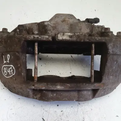 Audi A6 C7 PRZEDNI ZACISK HAMULCOWY lewy przód KIEROWCY