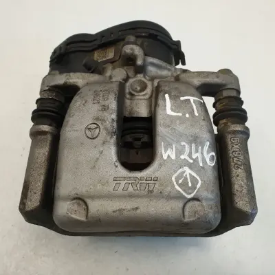 Mercedes W246 LEWY ZACISK HAMULCOWY lewy tył