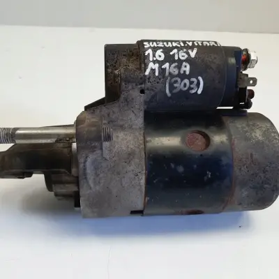 Suzuki Grand Vitara II 1.6 16V ROZRUSZNIK 31100-86G00