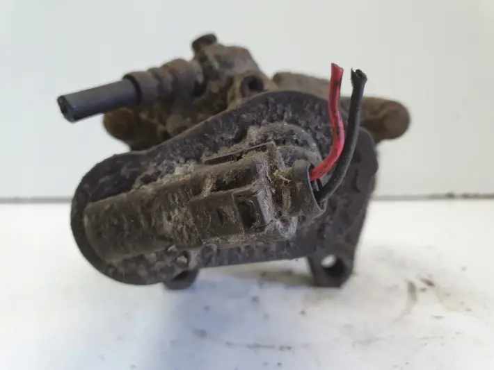 VW Tiguan TYLNY ZACISK HAMULCOWY prawy tył ORYGINAŁ