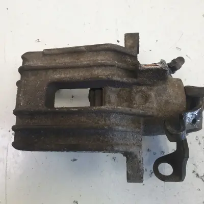 Skoda Octavia I ZACISK HAMULCOWY lewy TYŁ TYLNY