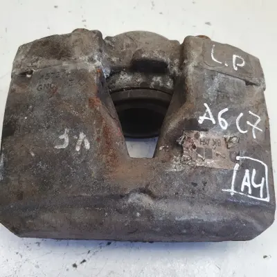 Audi A6 C7 PRZEDNI ZACISK HAMULCOWY lewy przód kierowcy