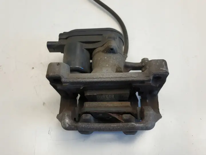 Santa Fe IV 2.2 CRDI PRAWY TYLNY ZACISH HAMULCOWY