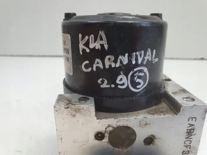 Kia Carnival II POMPA ABS hamulcowa 0K2FA-667B0