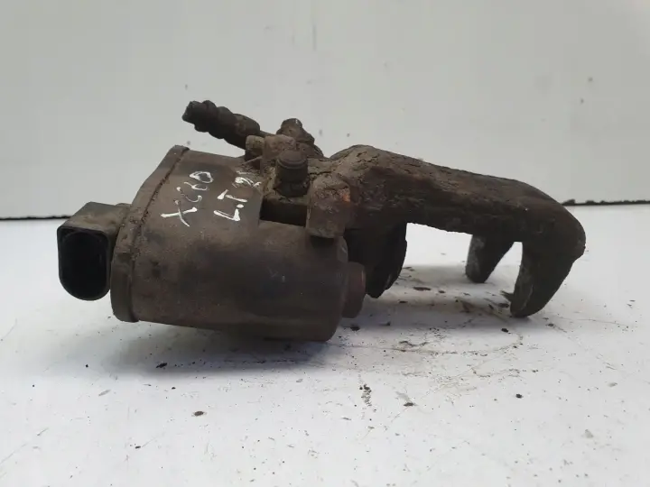 Volvo S60II XC60 TYLNY ZACISK HAMULCOWY LEWY tył KIEROWCY