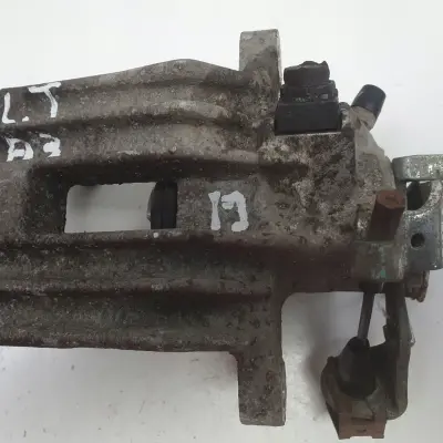 VW Golf IV Bora Audi A3 Toledo II LEWY ZACISK HAMULCOWY tył kierowcy