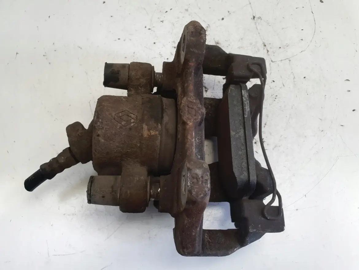 Renault Clio IV LEWY PRZEDNI ZACISK HAMULCOWY przód kierowcy 410104961R