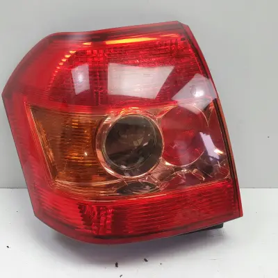 Toyota Corolla E12 LIFT TYLNIA TYLNA LAMPA LEWA lewy tył 81550-02301