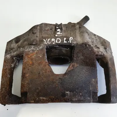 Volvo XC90 I PRZEDNI ZACISK HAMULCOWY lewy przód Kierowcy L.P 30657303 959