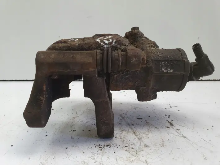 VW Tiguan TYLNY ZACISK HAMULCOWY lewy tył ORYGINAŁ