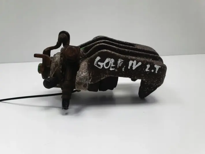 VW Golf IV Audi A3 LEWY ZACISK HAMULCOWY tył kierowcy