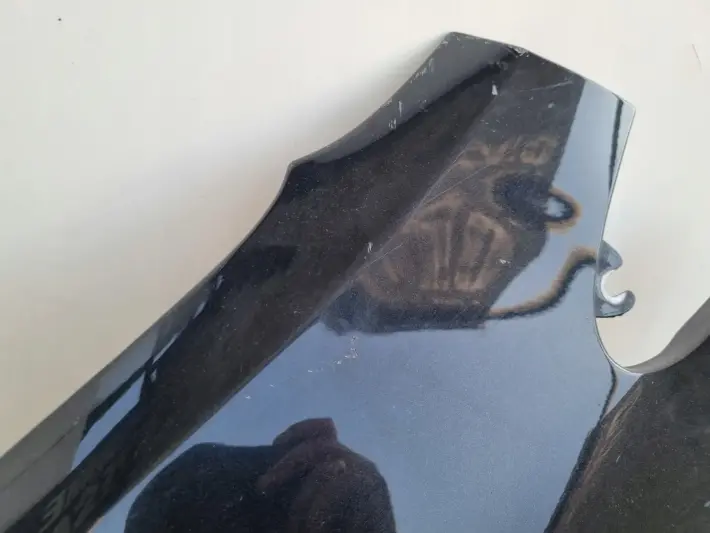 Opel Corsa D 06-14r PRZEDNI BŁOTNIK LEWY KIEROWCY czarny Z22C