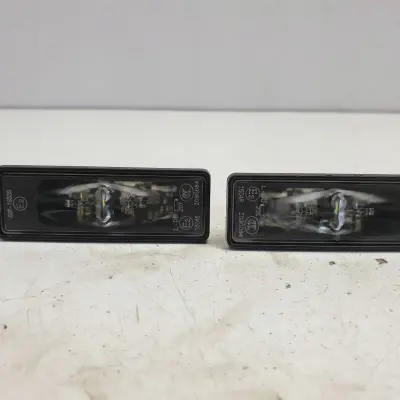 Opel Corsa F LAMPKA TABLICY REJESTRACYJNEJ