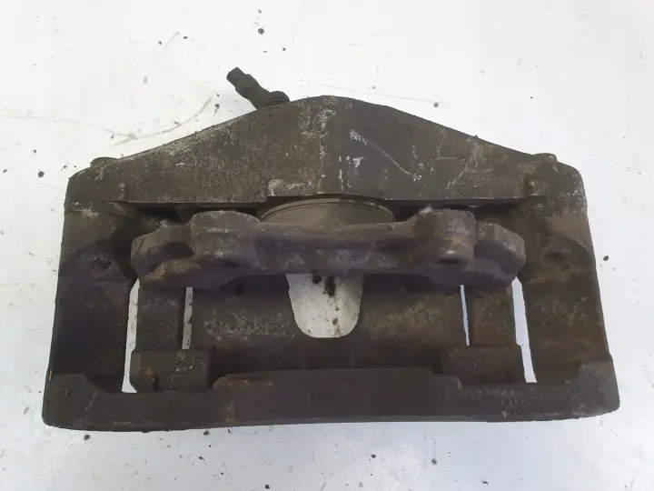 Volvo V40 II PRZEDNI ZACISK HAMULCOWY lewy przód KIEROWCY L.P 975