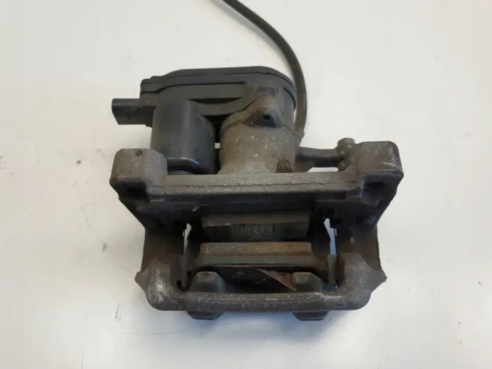 Santa Fe IV 2.2 CRDI PRAWY TYLNY ZACISH HAMULCOWY