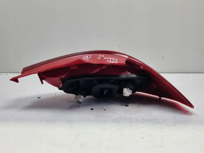 Opel Corsa D 3D HTB 06-14r TYLNIA LAMPA LEWA LEWY TYŁ 13211840 89038962A