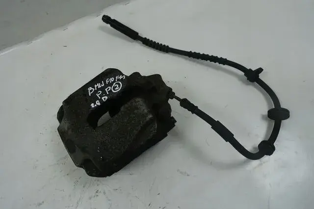 BMW F10 F11 2.0 D PRZEDNI ZACISK HAMULCOWY prawy