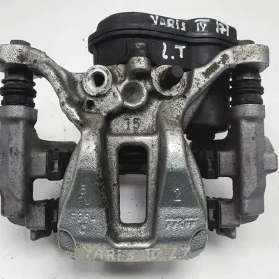 Toyota Yaris IV TYLNY ZACISK HAMULCOWY lewy tył KIEROWCY 46310-0D010