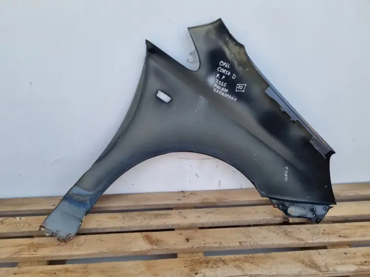 Opel Corsa D 06-14r PRZEDNI BŁOTNIK LEWY KIEROWCY czarny Z22C
