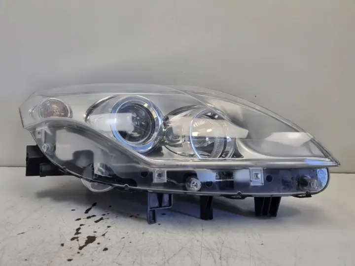 Renault Laguna III 07-10r PRZEDNIA LAMPA PRAWA PRAWY PRZÓD 260100033R