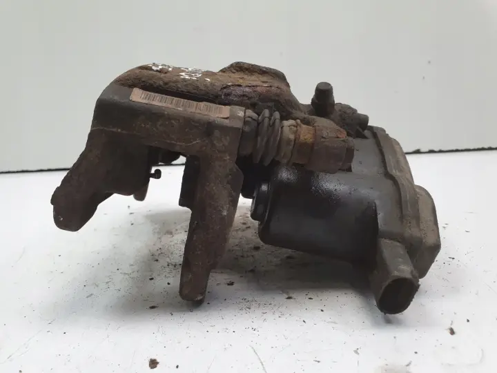 Audi Q5 TYLNY ZACISK HAMULCOWY lewy tył KIEROWCY 32347485B