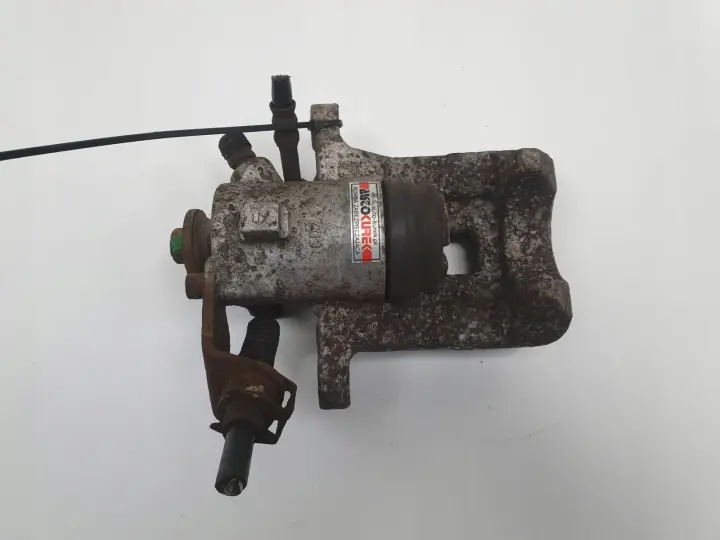 VW Golf IV Audi A3 LEWY ZACISK HAMULCOWY tył kierowcy