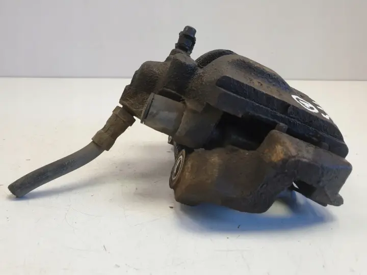 Saab 95 9-5 lift 2.0 T ZACISK HAMULCOWY Lewy tył