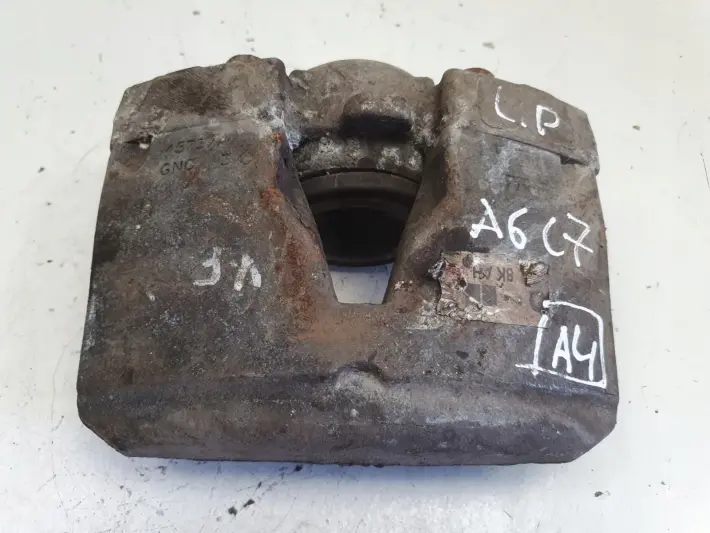 Audi A6 C7 PRZEDNI ZACISK HAMULCOWY lewy przód kierowcy
