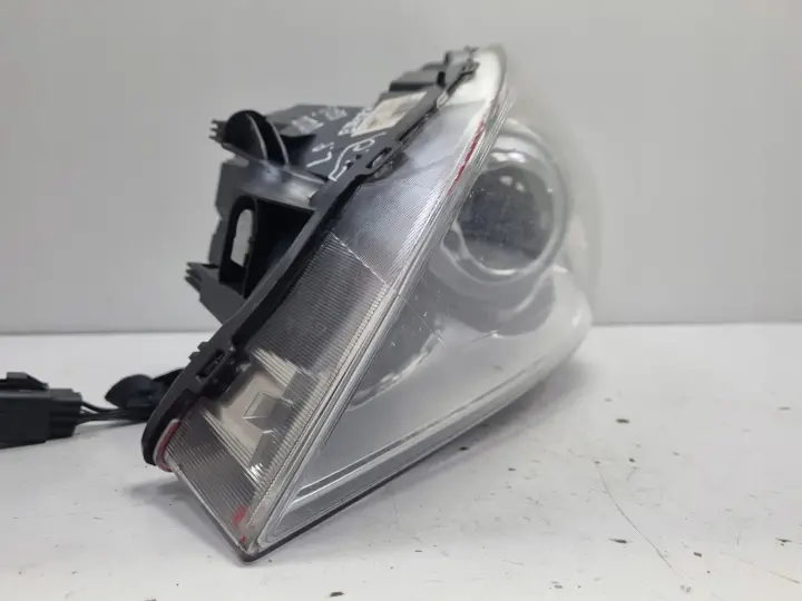 Volvo V60 S60 II 10-13r PRZEDNIA LAMPA LEWA lewy przód XENON 31383062