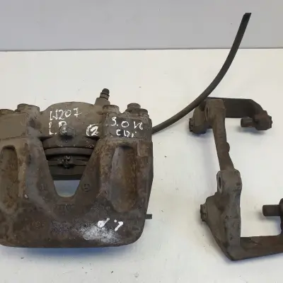 Mercedes C207 3.0 CDI ZACISK HAMULCOWY Lewy przód