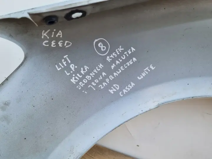 Kia Ceed Cee'd LIFT 09-12r PRZEDNI BŁOTNIK PRAWY PASAŻERA WD Cassa White