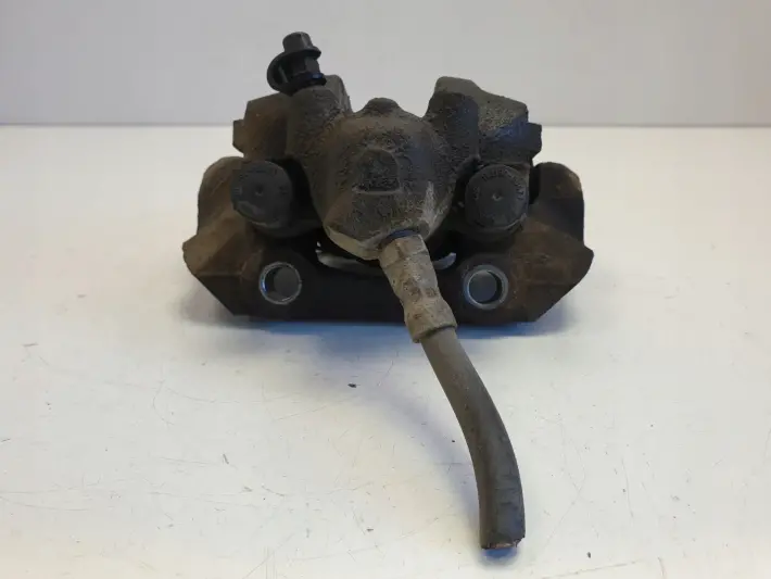 Saab 95 9-5 lift 2.0 T ZACISK HAMULCOWY Lewy tył