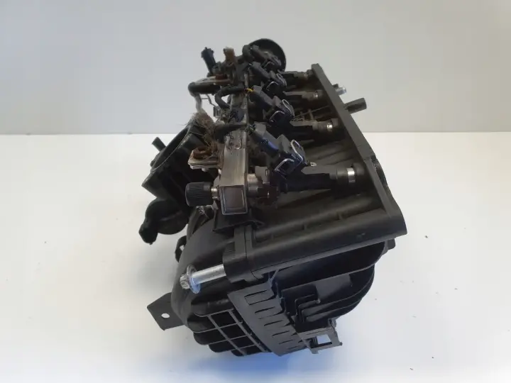 Opel Corsa D 1.4 16V KOLEKTOR SSĄCY 0280600064