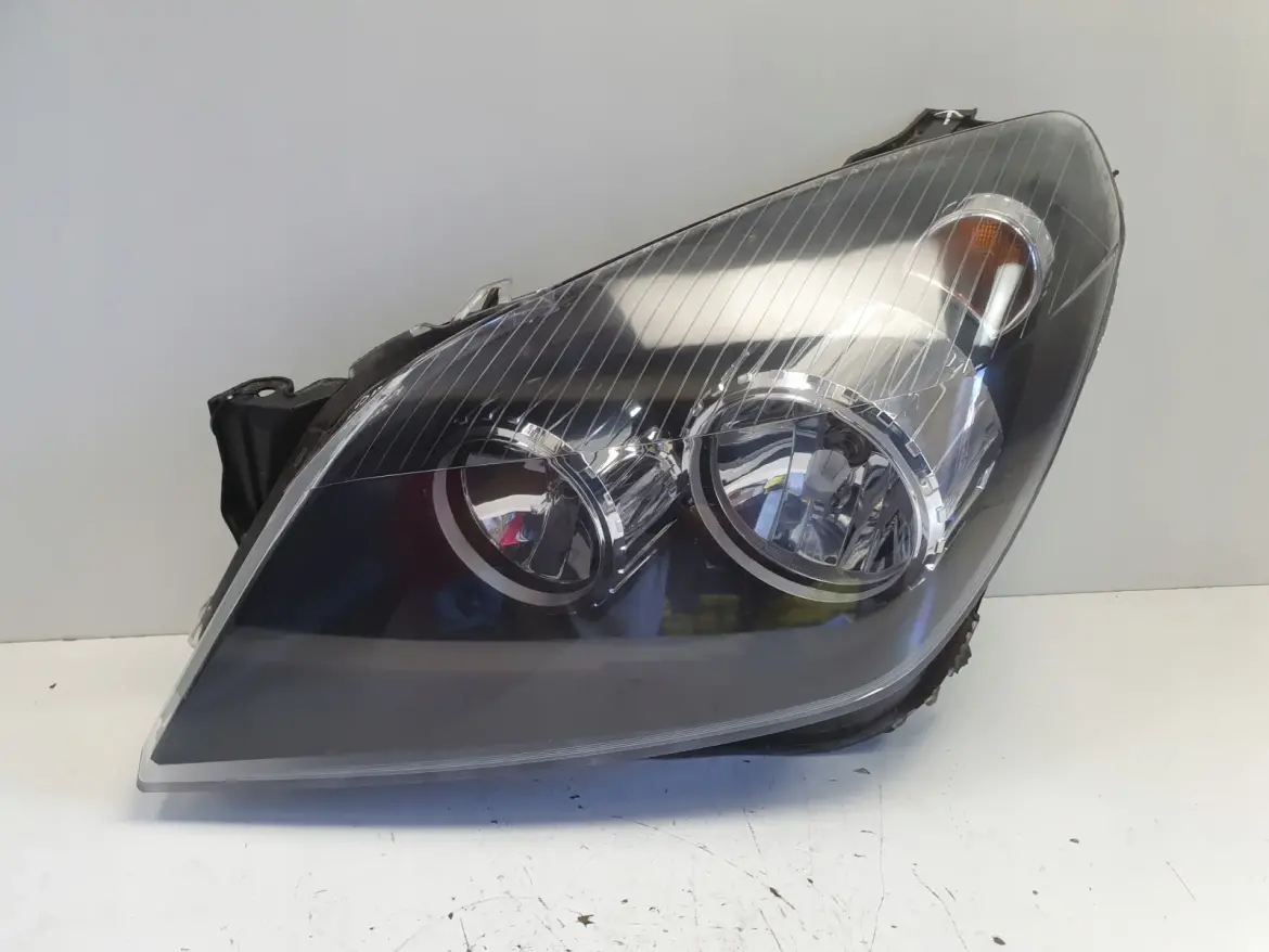 Opel Astra H III PRZEDNIA LAMPA LEWA lewy przód anglik Ciemny klosz Depo