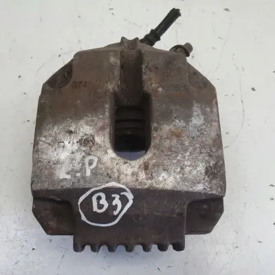 BMW E39 PRZEDNI ZACISK HAMULCOWY lewy przód kierowcy