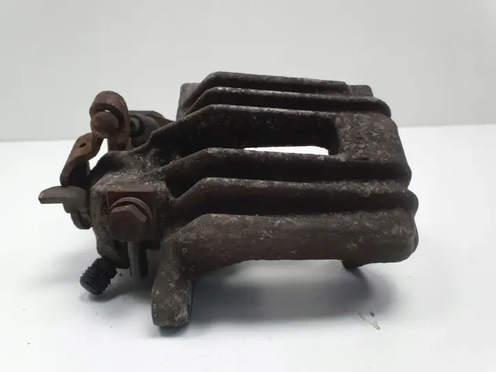 VW Golf IV Bora Audi A3 LEWY ZACISK HAMULCOWY tył kierowcy Lucas