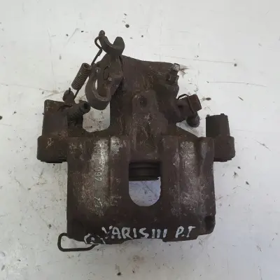 Toyota Yaris III TYLNY ZACISK HAMULCOWY prawy tył PASAŻERA