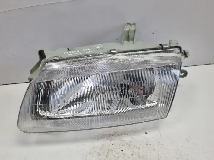 Mazda 323 BA 95-98r PRZEDNIA LAMPA LEWA LEWY PRZÓD nowa TYO 20-3115