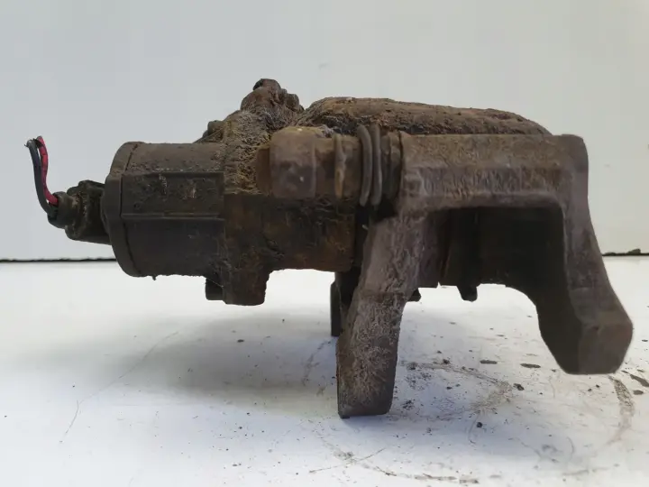 VW Tiguan TYLNY ZACISK HAMULCOWY prawy tył ORYGINAŁ